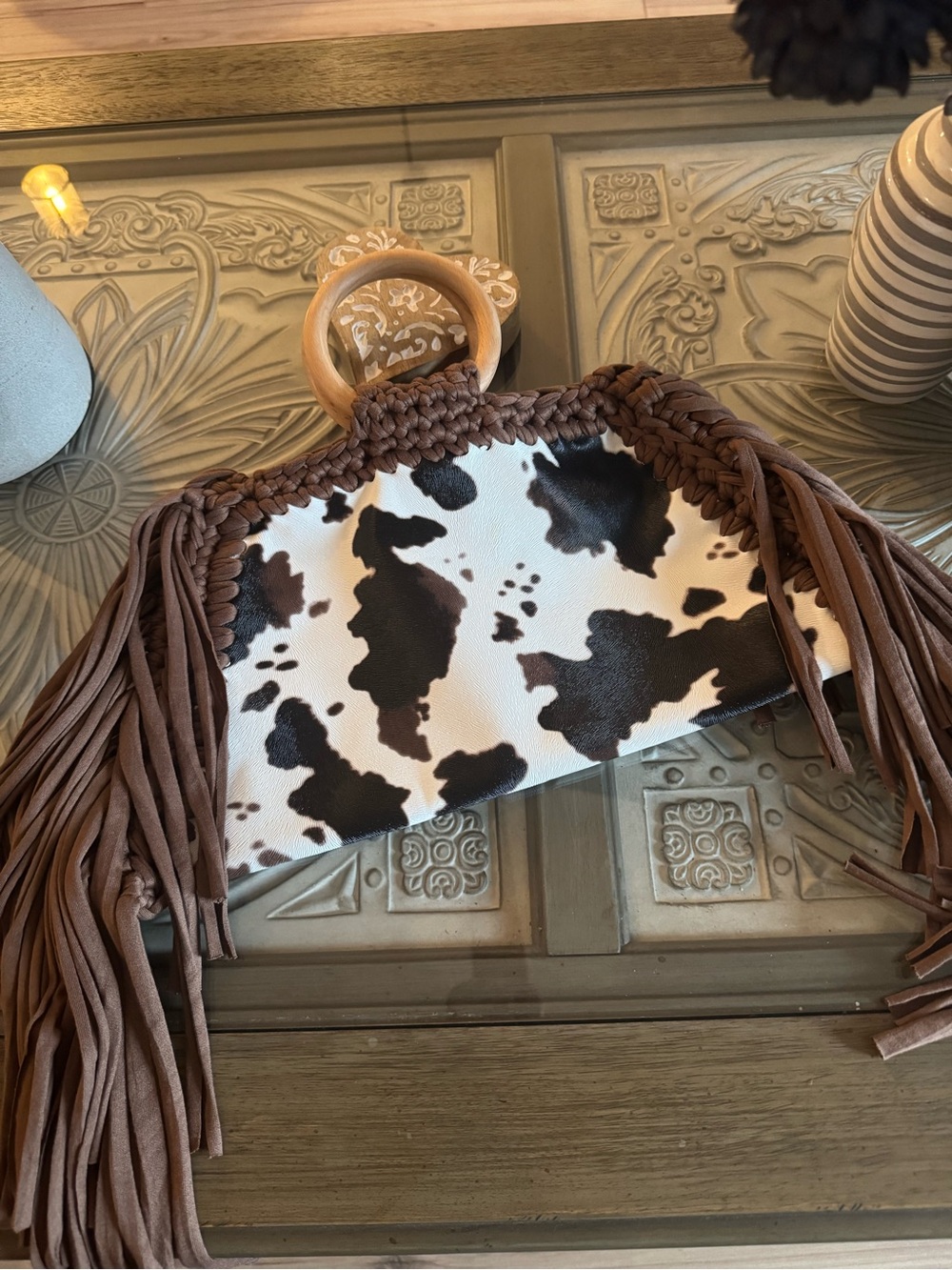 Bonita Bolso Fringe Cowhide Clutch with Wooden Ring Handle  by Yvonne
